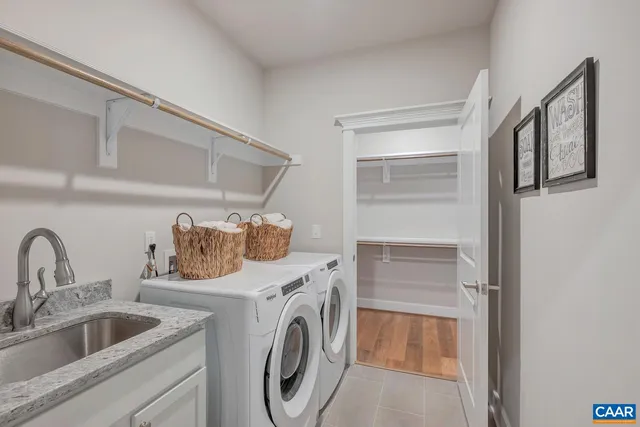 a utility room with dryer and washer
