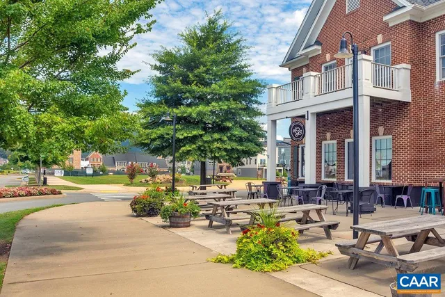 a view of a town with mountains in the background