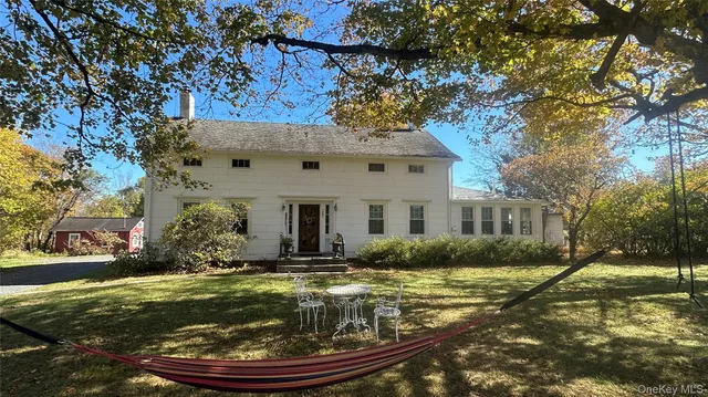 a view of a house with a garden
