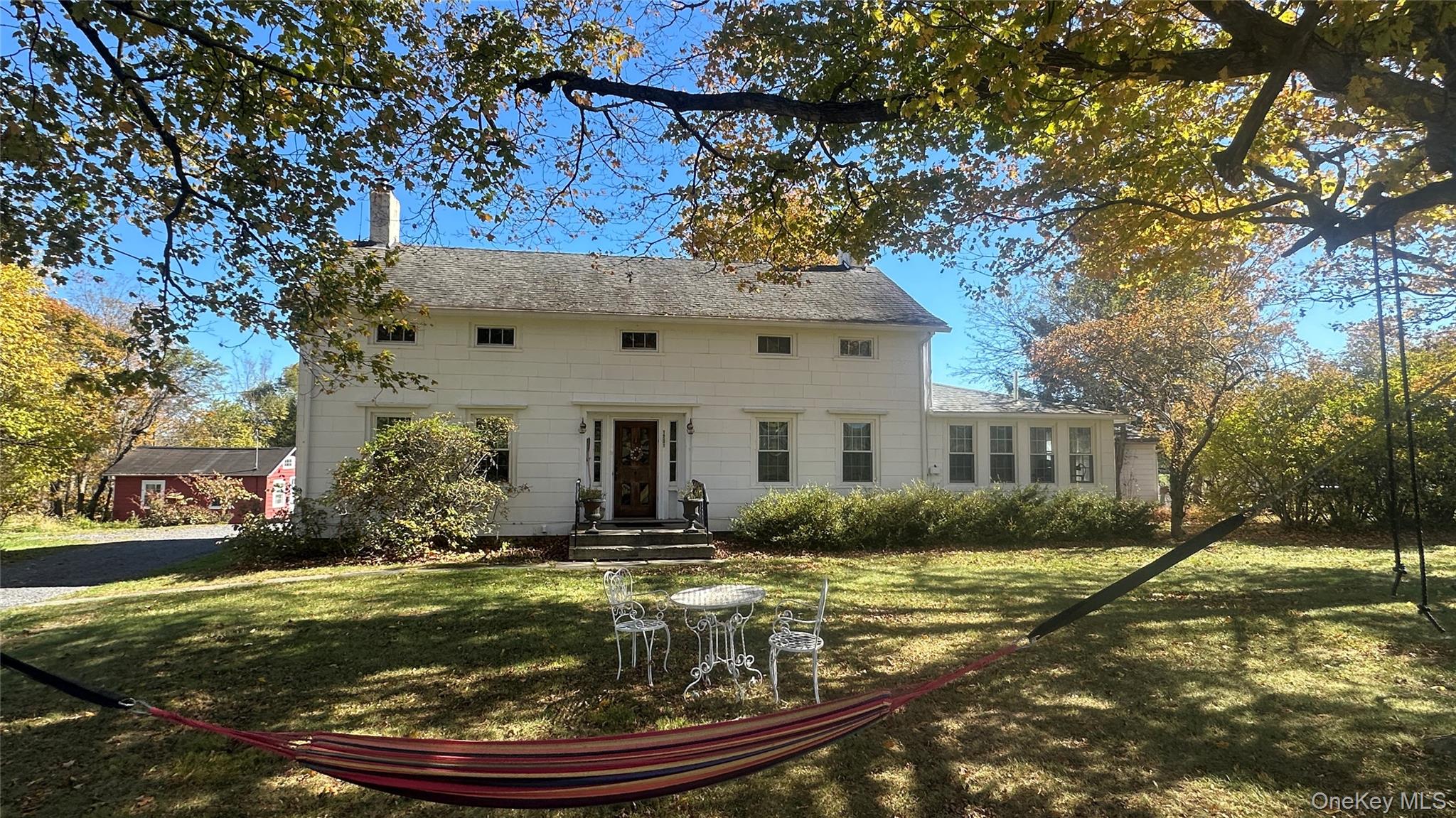 a view of a house with a garden