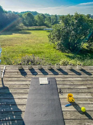 a view of a ocean with outdoor seating