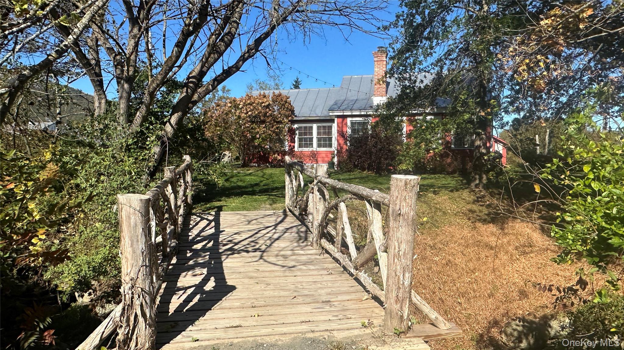 1201 Bruynswick Road Gardiner, NY 12525 - Photo 21 of 45 a view of a house with backyard and trees