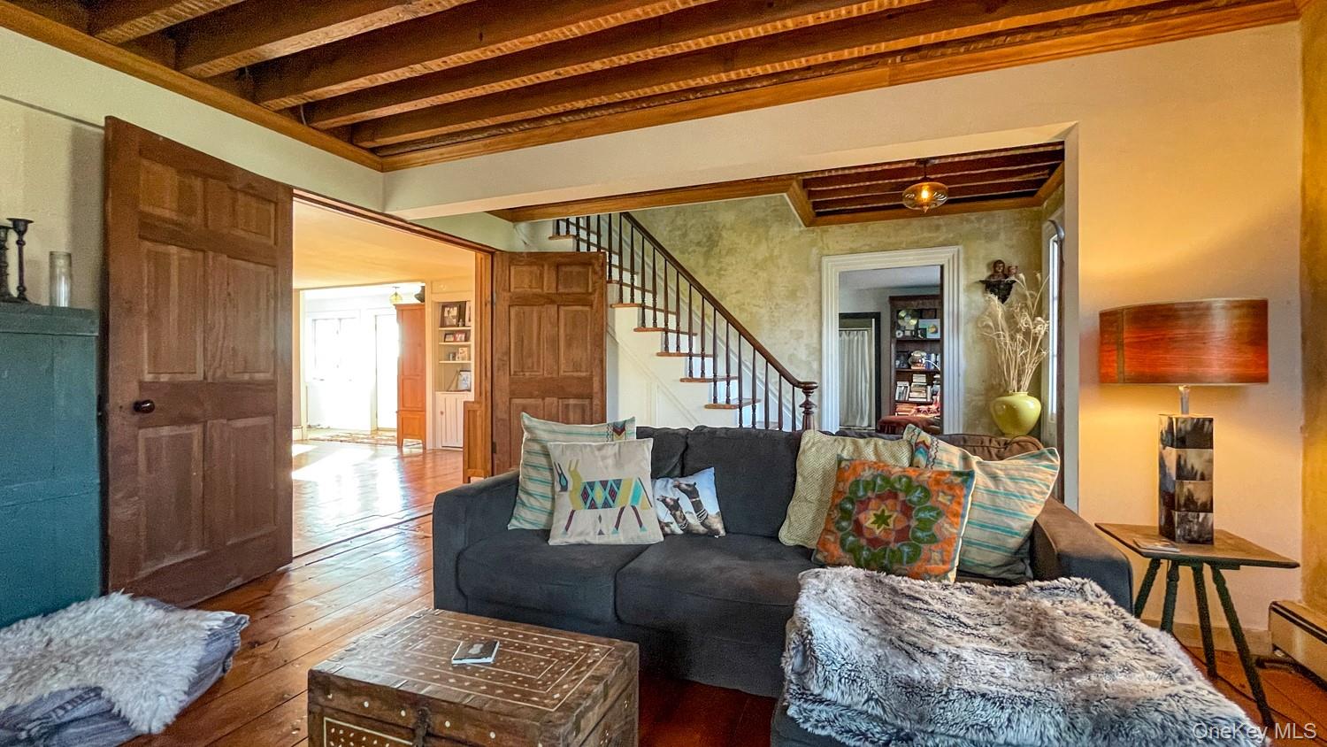 1201 Bruynswick Road Gardiner, NY 12525 - Photo 7 of 45 a living room with furniture and a window