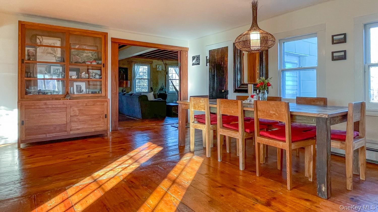 1201 Bruynswick Road Gardiner, NY 12525 - Photo 8 of 45 a very nice looking room with many windows and furniture