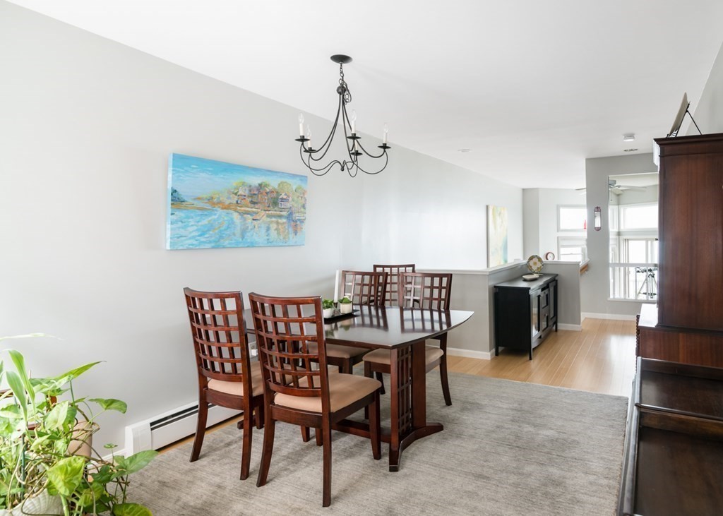16 Marina Drive, Unit 16 Hull, MA 02045 - Photo 4 of 22 a view of a dining room with furniture