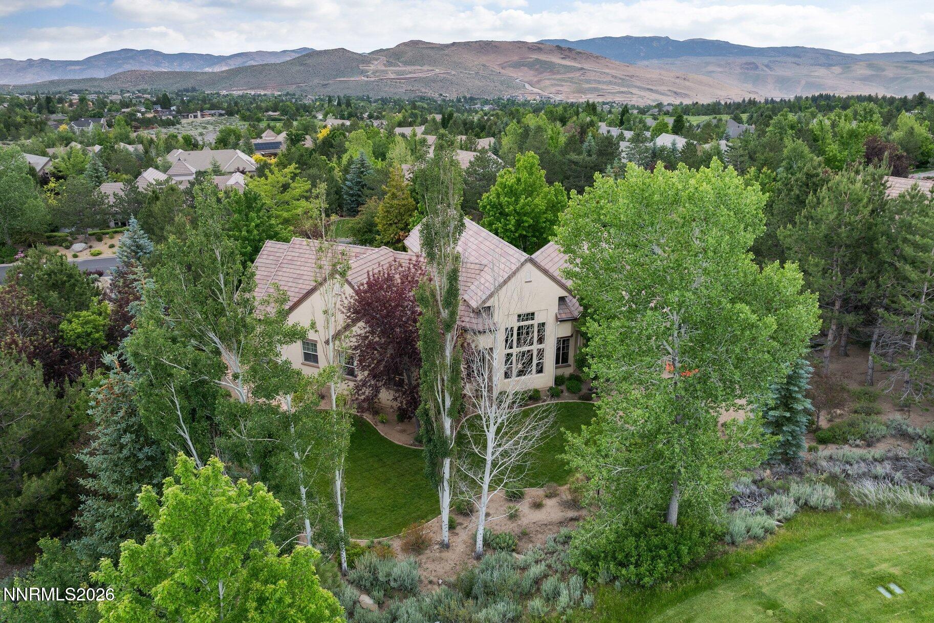 16925 Rue Du Parc Reno, NV 89511 - Photo 30 of 34 an aerial view of a house with mountain view
