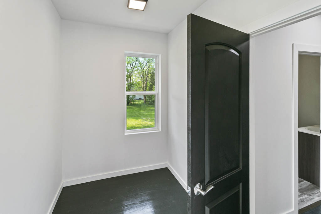 444 West Indiana Avenue Beecher, IL 60401 - Photo 12 of 20 an empty room with windows and closet
