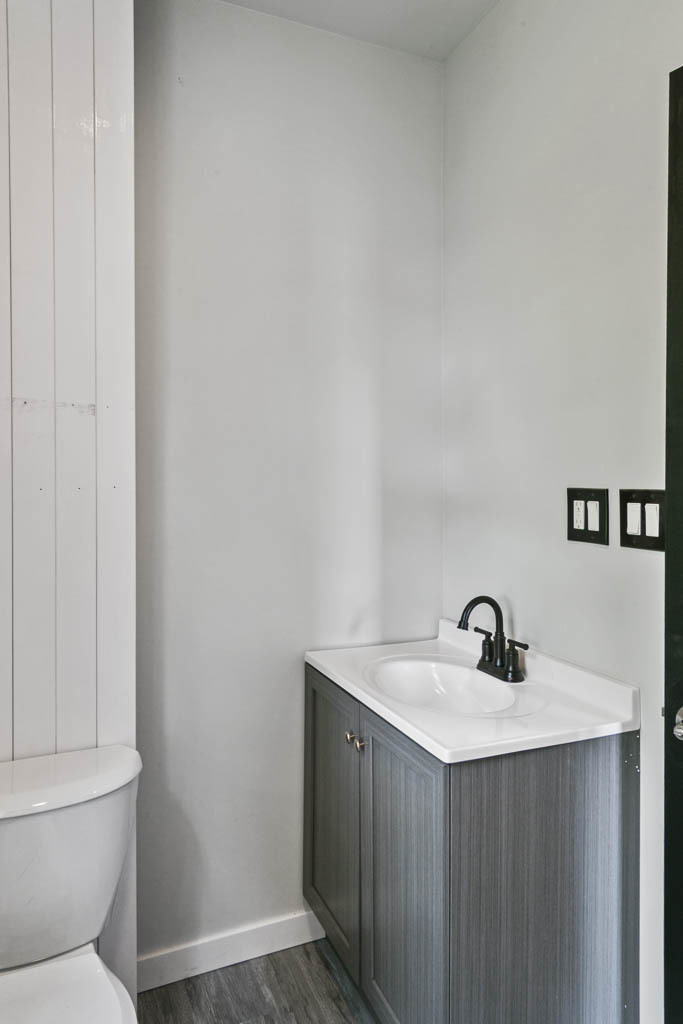 444 West Indiana Avenue Beecher, IL 60401 - Photo 14 of 20 a bathroom with a sink and a mirror