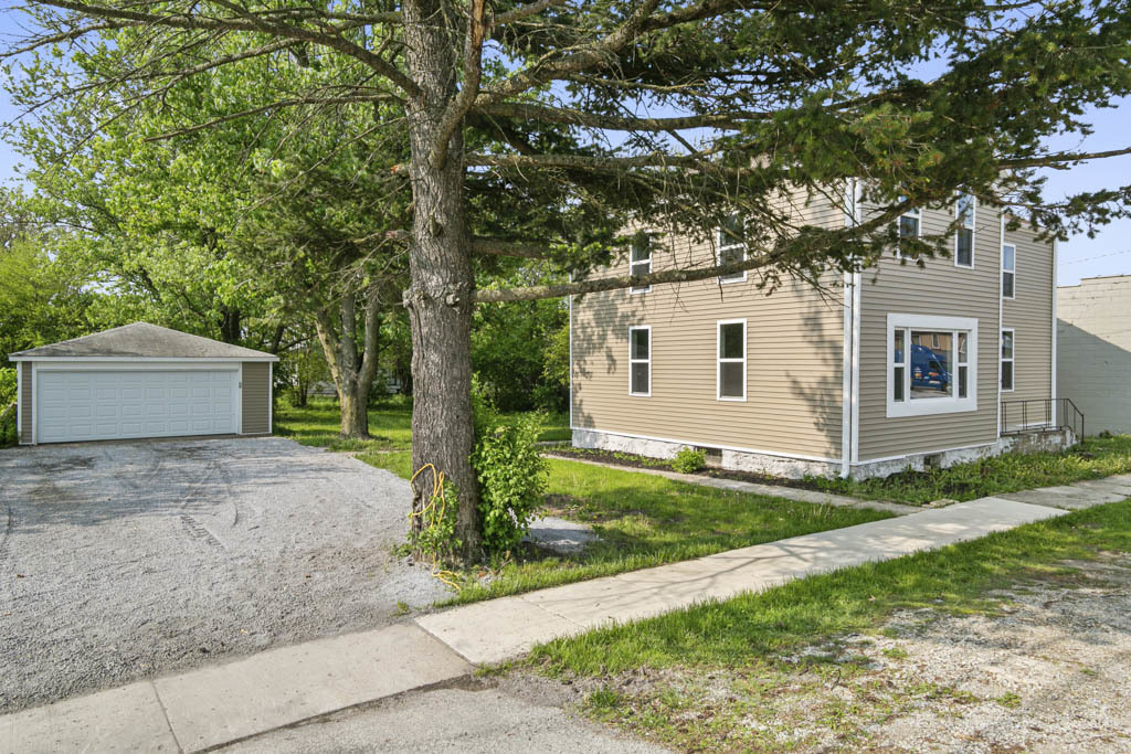 444 West Indiana Avenue Beecher, IL 60401 - Photo 2 of 20 a view of a house with a yard