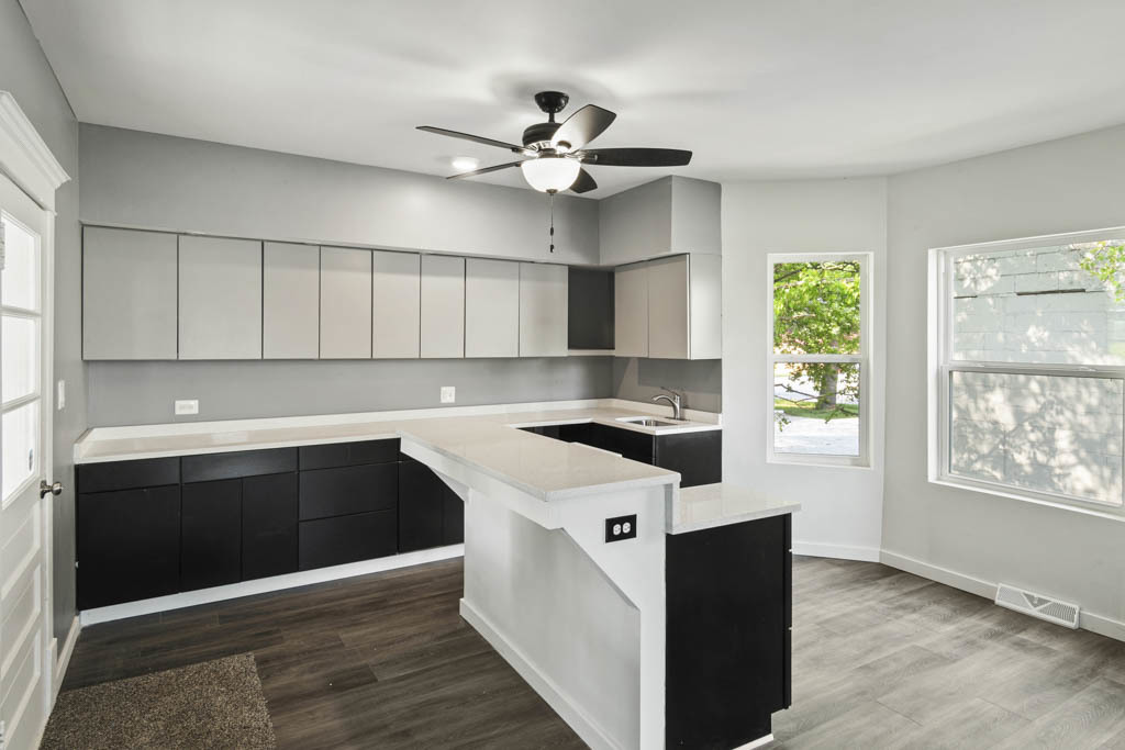 444 West Indiana Avenue Beecher, IL 60401 - Photo 5 of 20 a kitchen with stainless steel appliances granite countertop a stove and a sink