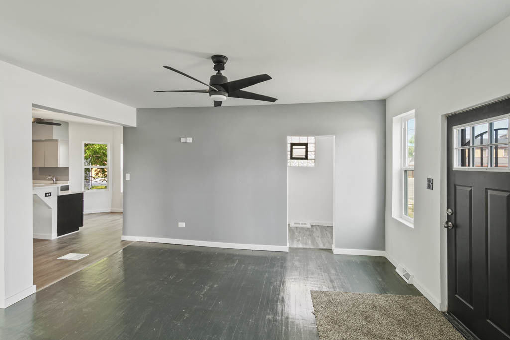 444 West Indiana Avenue Beecher, IL 60401 - Photo 9 of 20 wooden floor in an empty room with a window