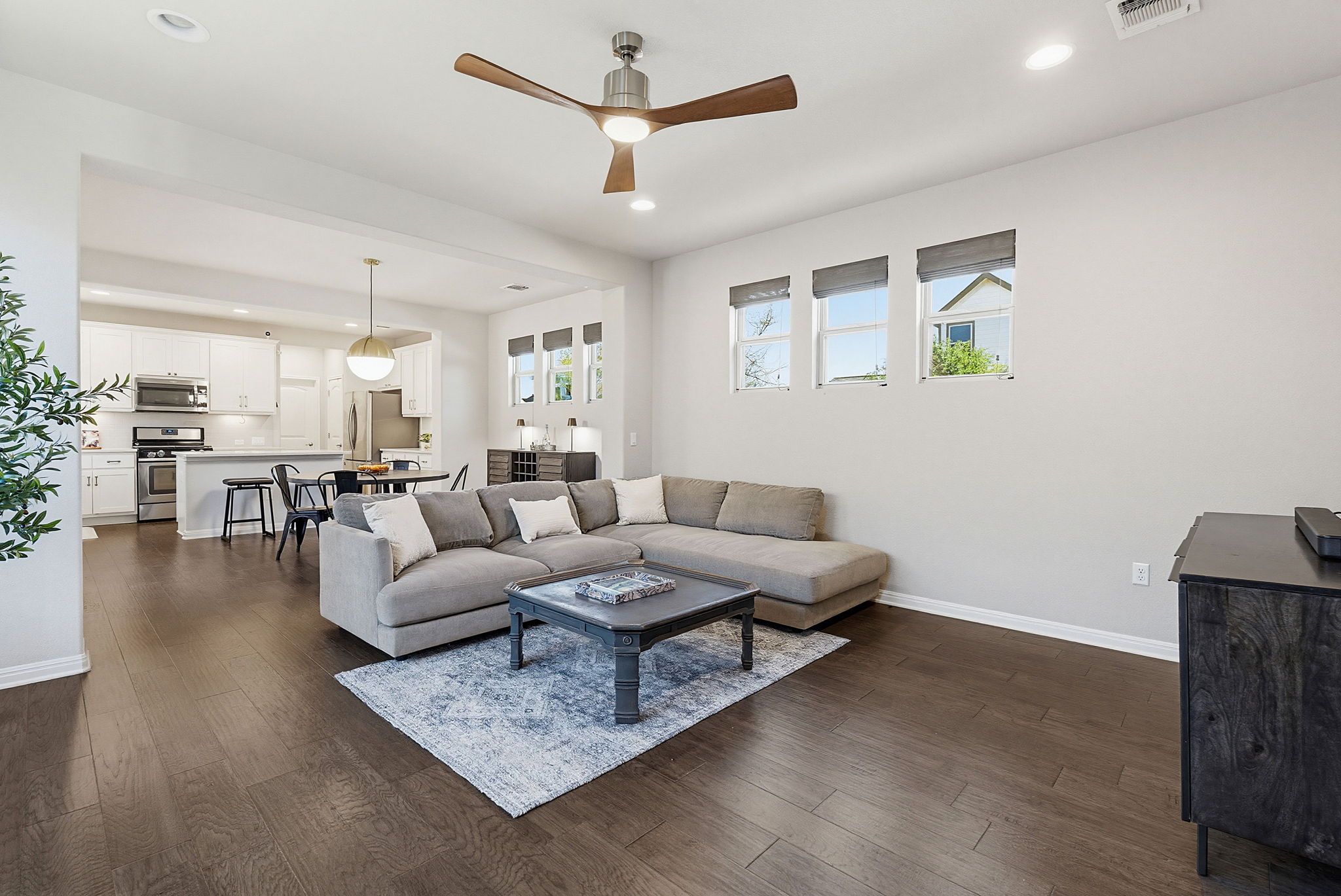 5820 Baythorne Drive Austin, TX 78747 - Photo 11 of 32 a living room with furniture and wooden floor