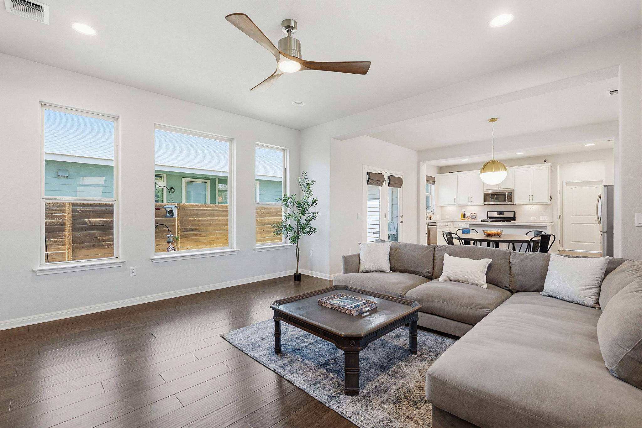 5820 Baythorne Drive Austin, TX 78747 - Photo 2 of 32 a living room with furniture and a large window