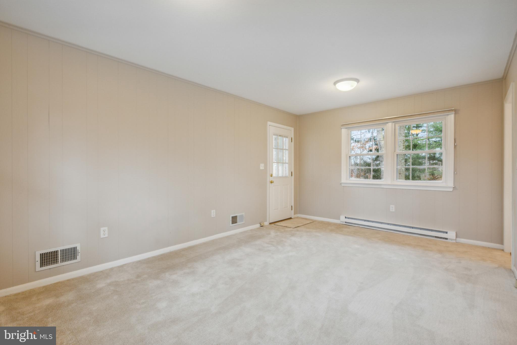 9308 Emory Grove Road Gaithersburg, MD 20877 - Photo 10 of 45 Family room (carpet is brand new)