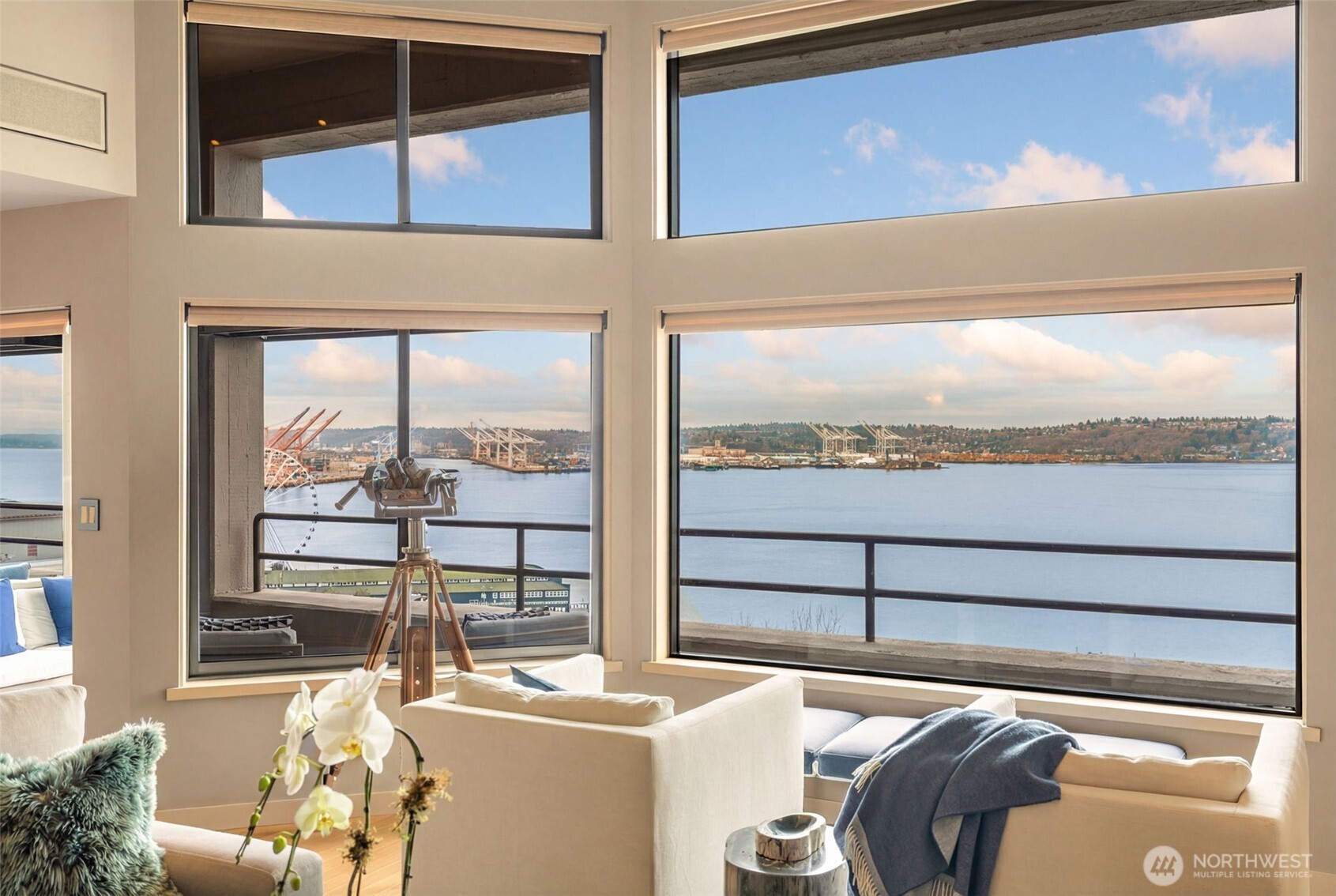2021 1st Avenue, Unit E8 Seattle, WA 98121 - Photo 1 of 32 a room with furniture and window
