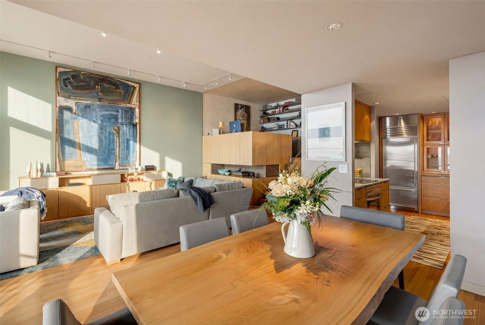 2021 1st Avenue, Unit E8 Seattle, WA 98121 - Photo 11 of 32 a dining room with furniture