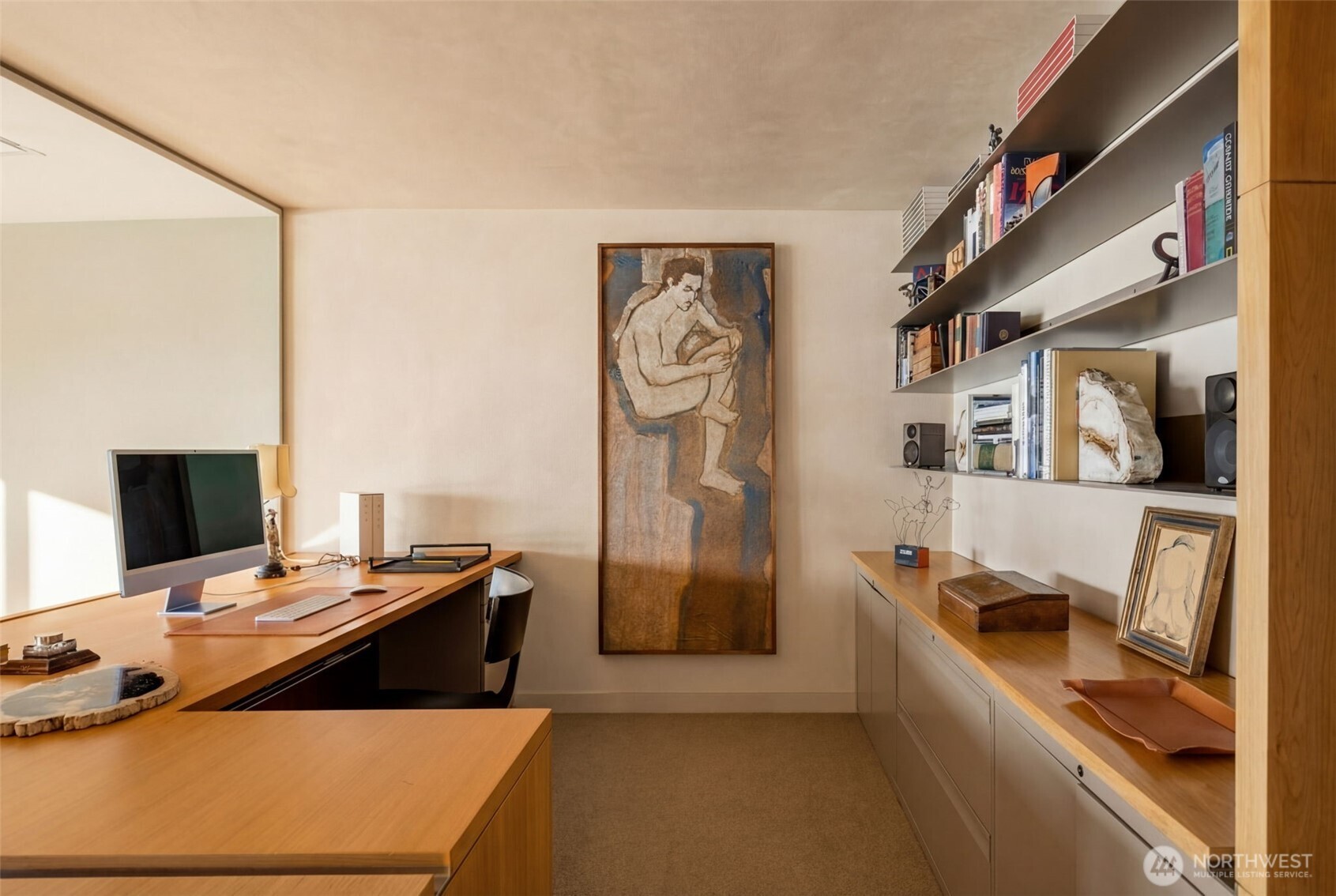 2021 1st Avenue, Unit E8 Seattle, WA 98121 - Photo 20 of 32 a room with furniture and flat screen tv