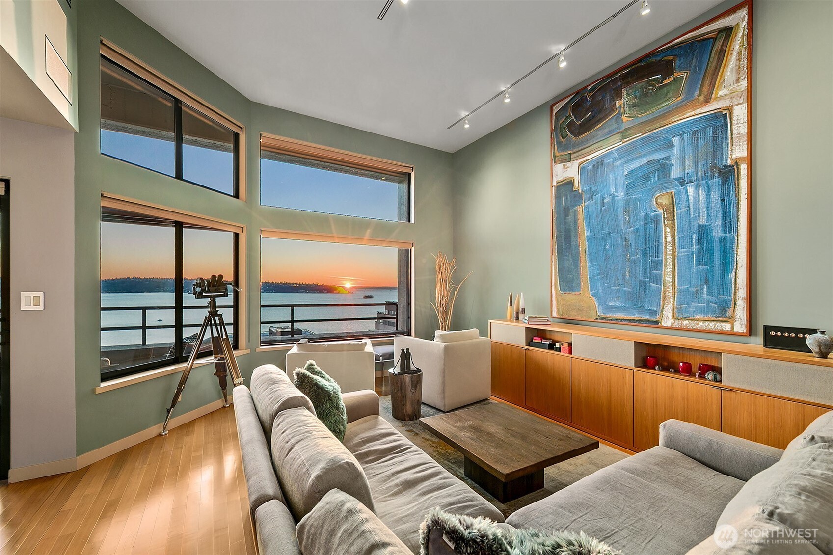 2021 1st Avenue, Unit E8 Seattle, WA 98121 - Photo 2 of 32 a living room with furniture and a large window