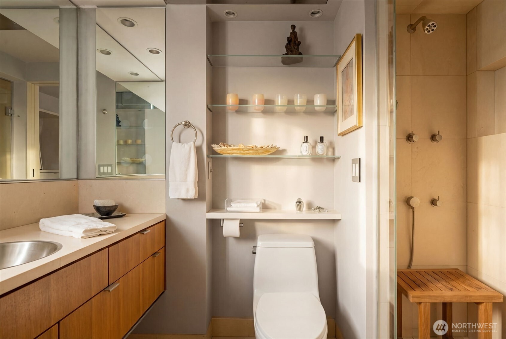 2021 1st Avenue, Unit E8 Seattle, WA 98121 - Photo 23 of 32 a bathroom with a sink a toilet and shower