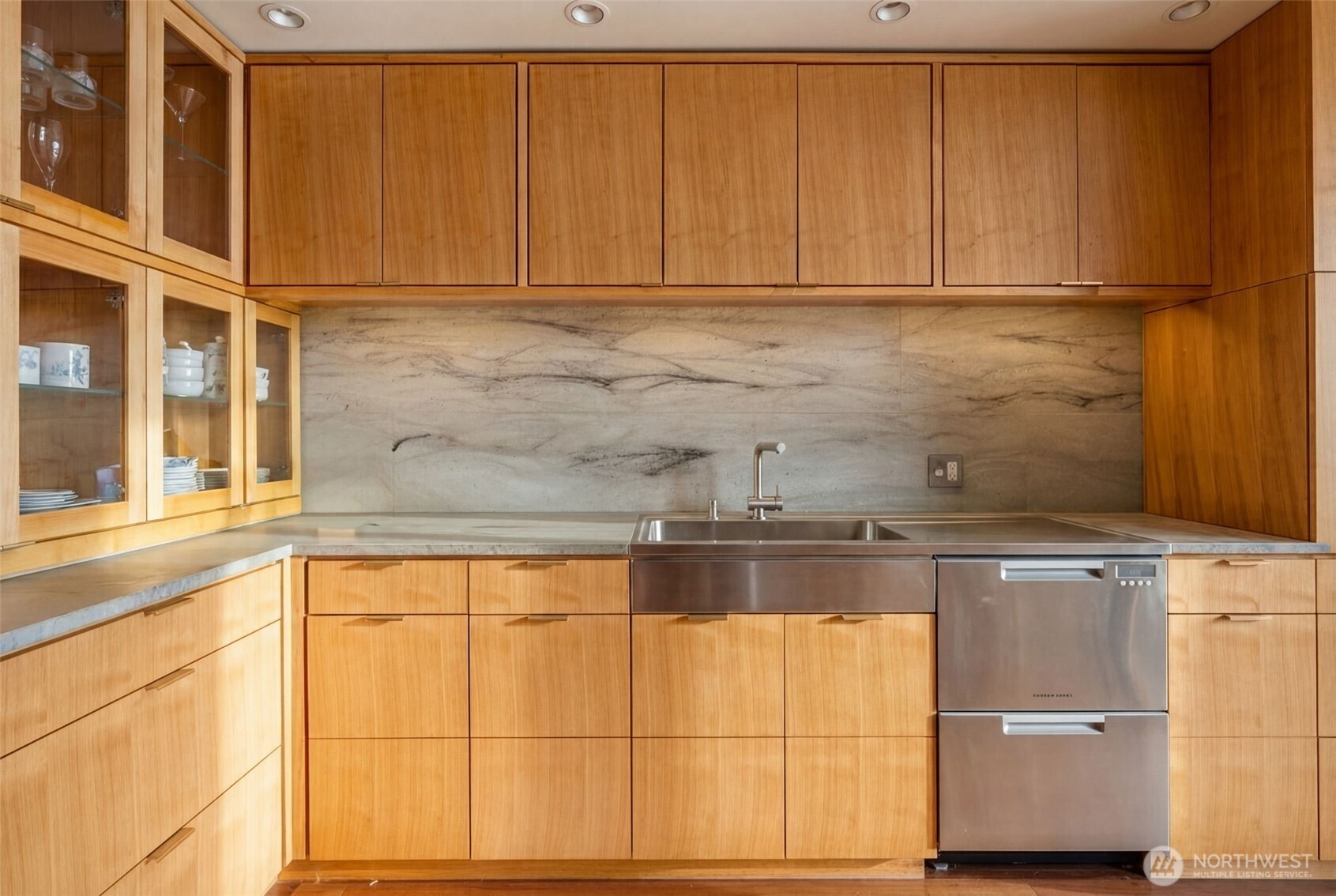 2021 1st Avenue, Unit E8 Seattle, WA 98121 - Photo 4 of 32 a view of a kitchen with a sink