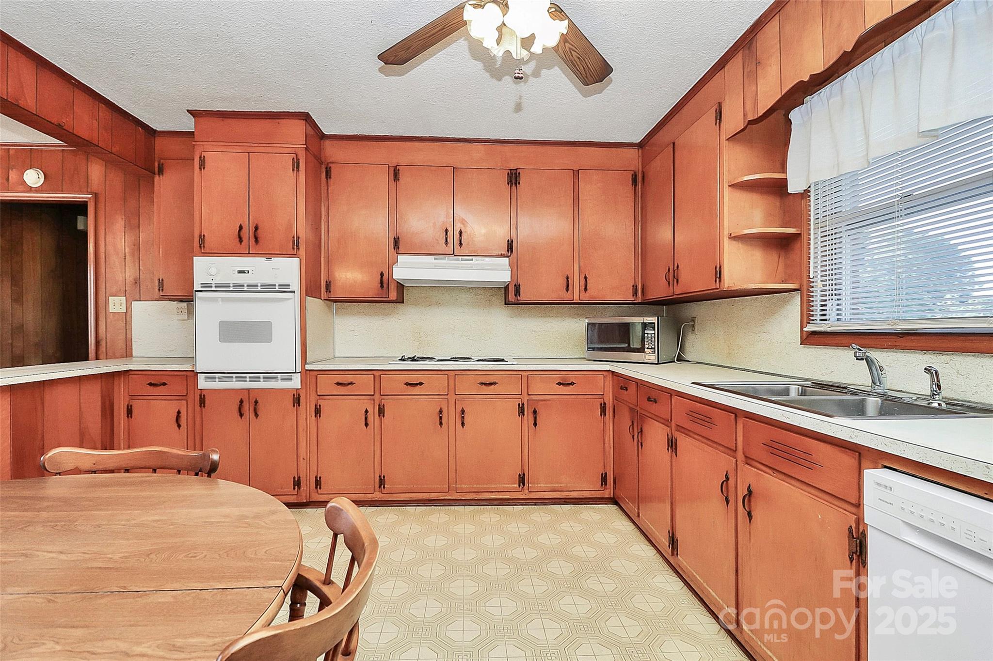6217 Stack Road Monroe, NC 28112 - Photo 15 of 37 a kitchen with stainless steel appliances granite countertop a sink dishwasher stove and cabinets