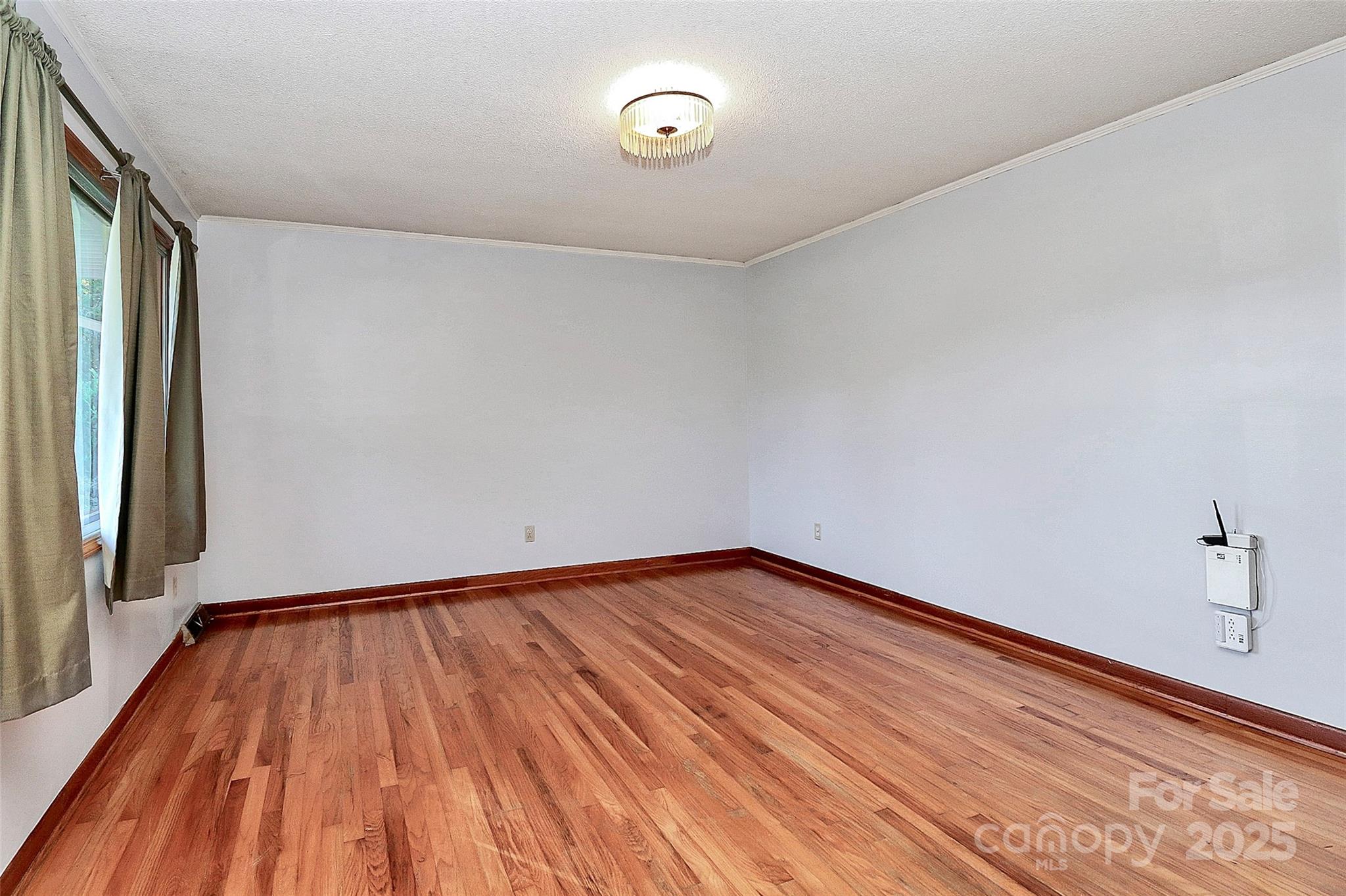 6217 Stack Road Monroe, NC 28112 - Photo 18 of 37 a view of an empty room with wooden floor
