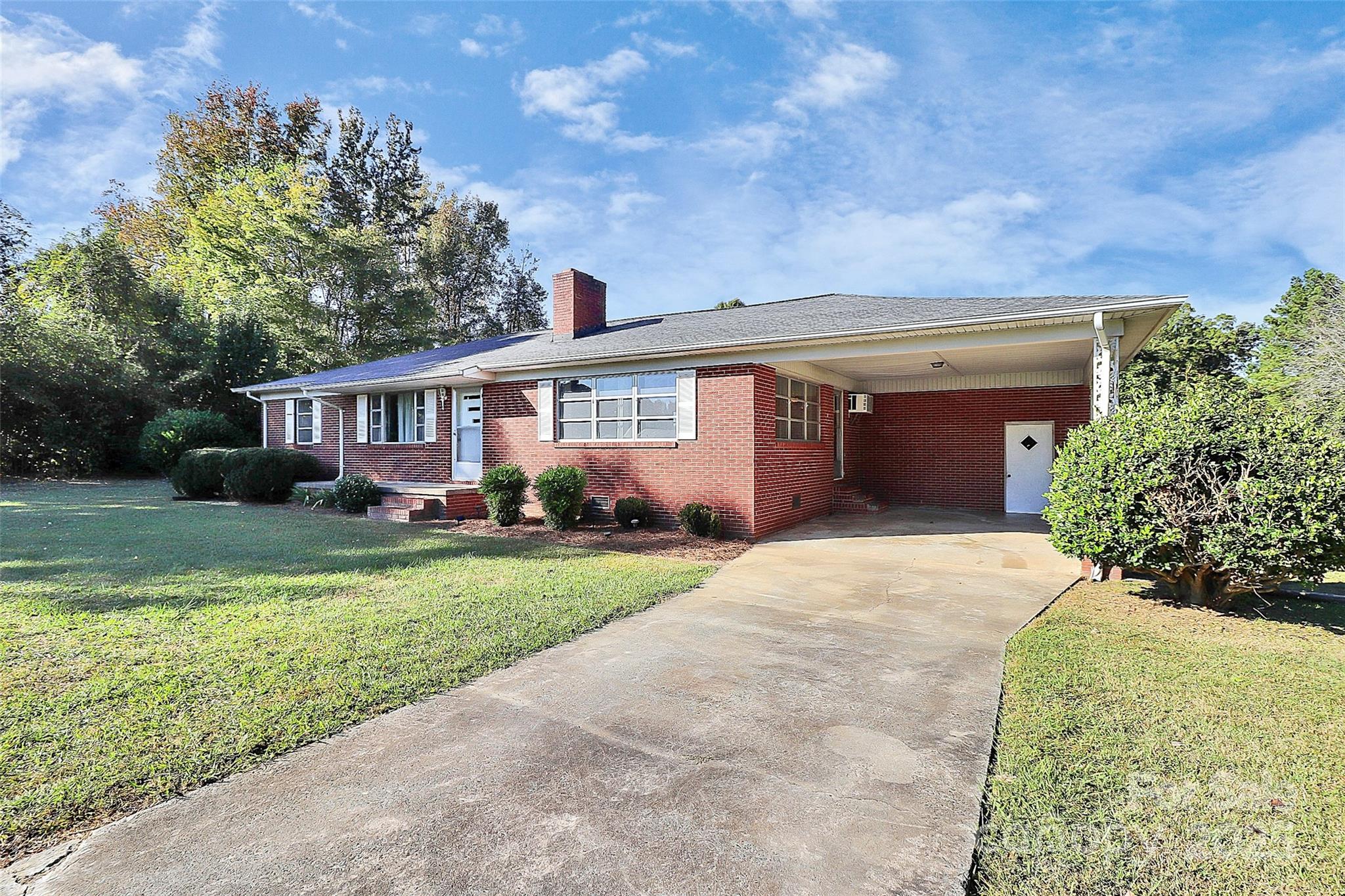 6217 Stack Road Monroe, NC 28112 - Photo 2 of 37 front view of a house with a yard