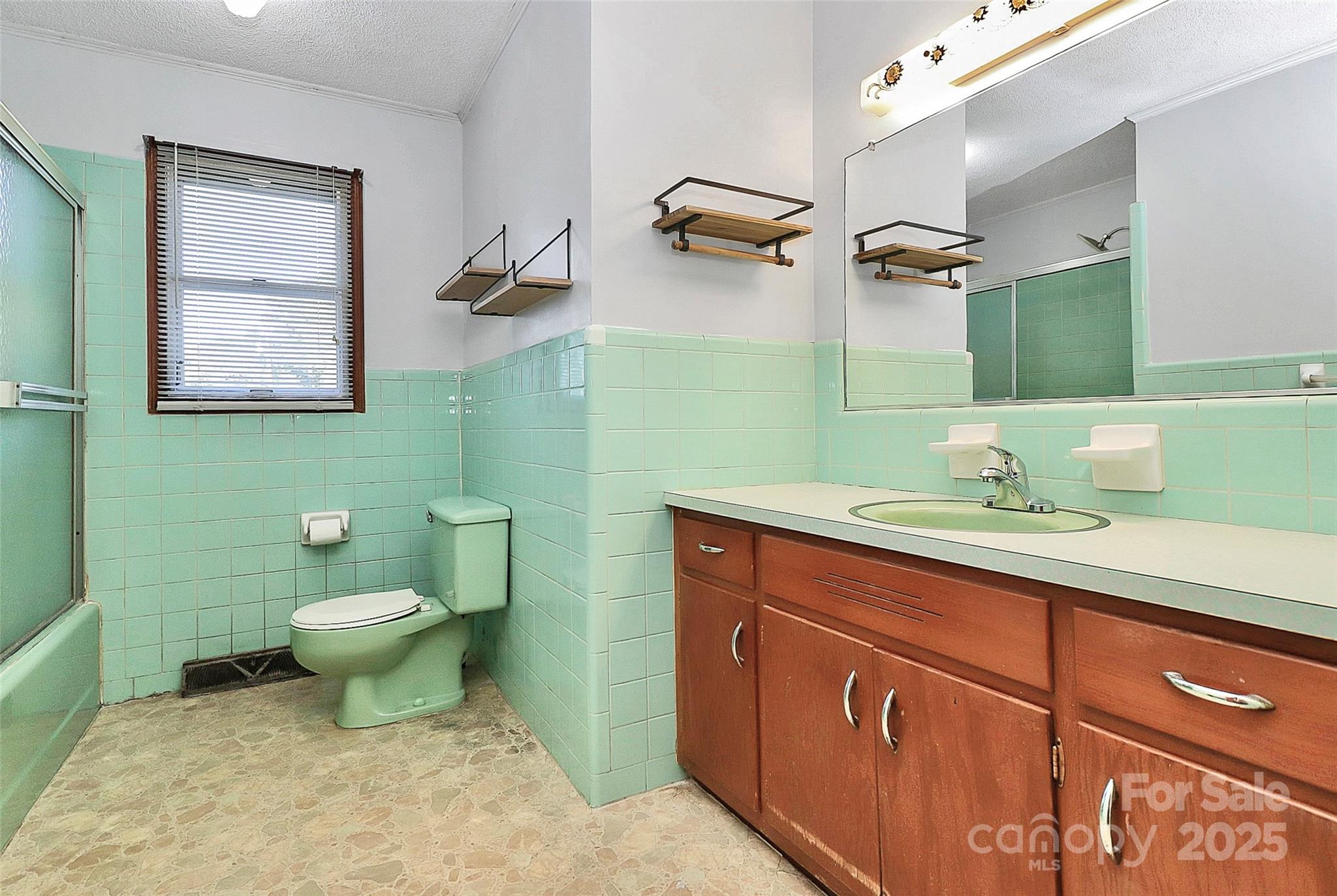 6217 Stack Road Monroe, NC 28112 - Photo 22 of 37 a bathroom with a toilet sink and mirror