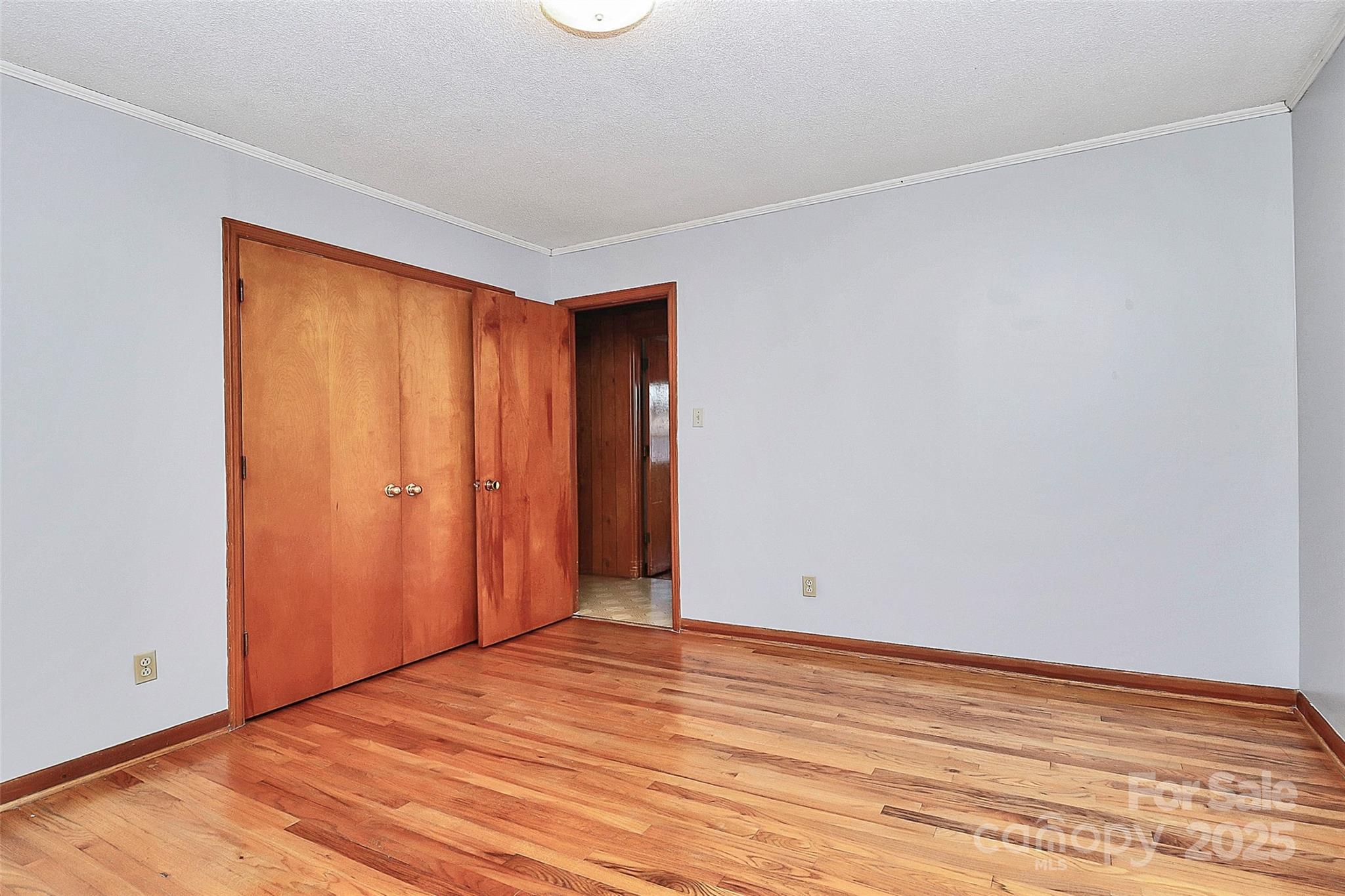 6217 Stack Road Monroe, NC 28112 - Photo 26 of 37 a view of an empty room with wooden floor