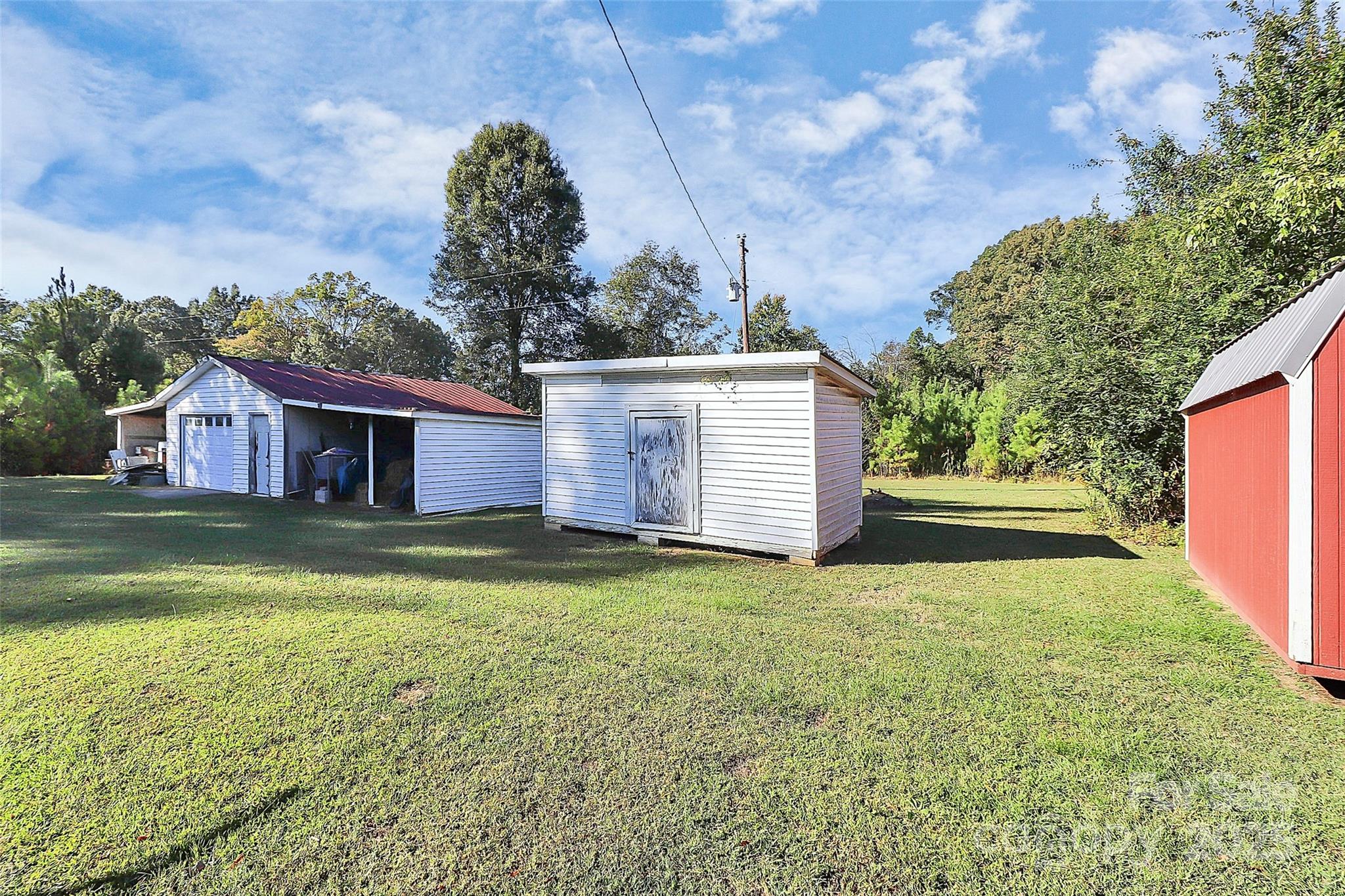 6217 Stack Road Monroe, NC 28112 - Photo 29 of 37 a view of a house with backyard and garden