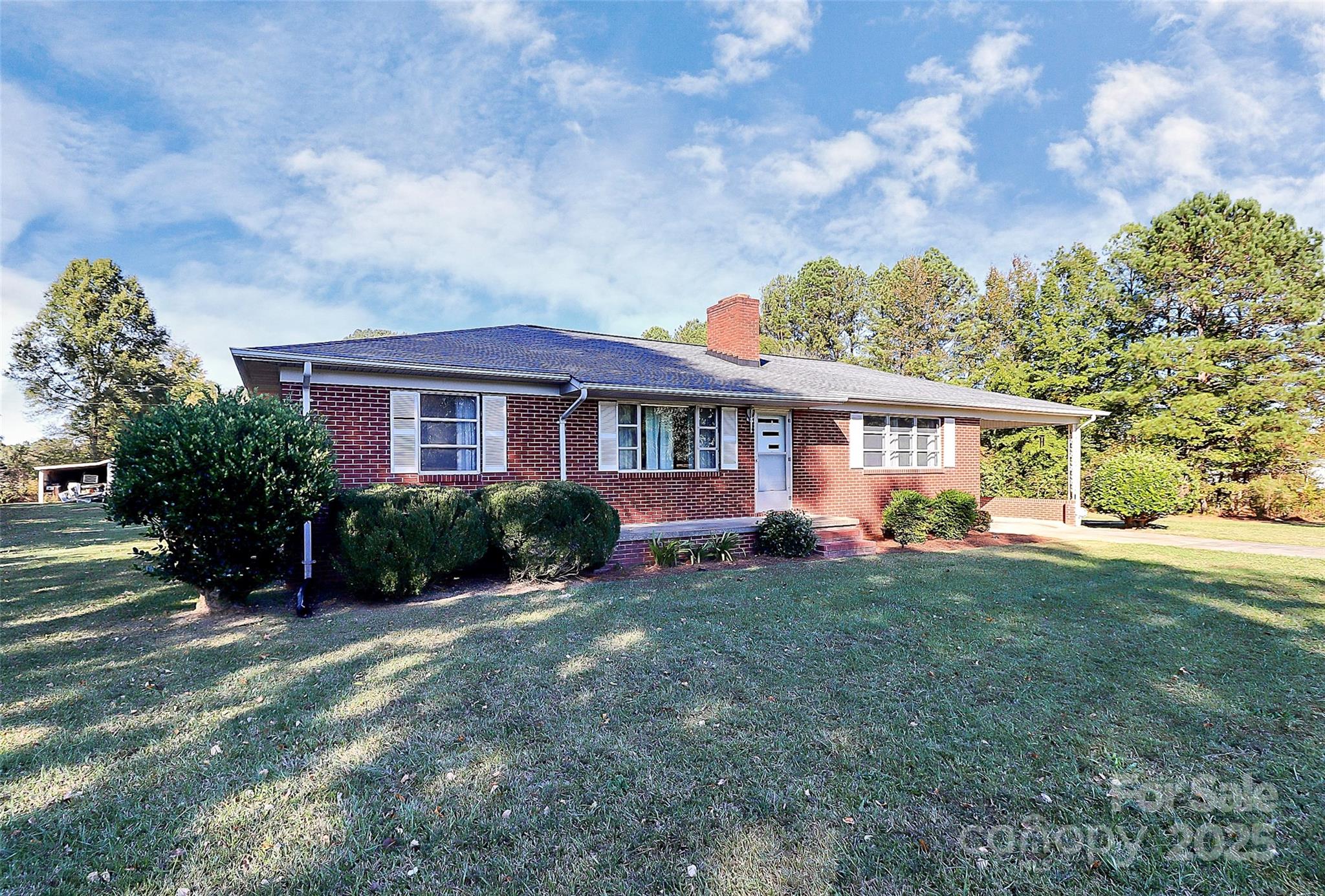 6217 Stack Road Monroe, NC 28112 - Photo 3 of 37 a view of a house with a yard