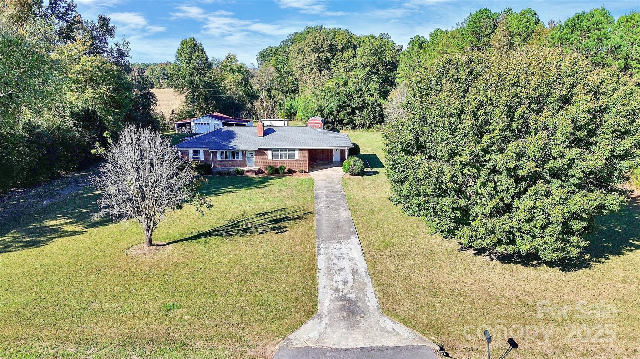 6217 Stack Road Monroe, NC 28112 - Photo 31 of 37 a view of a house with a yard