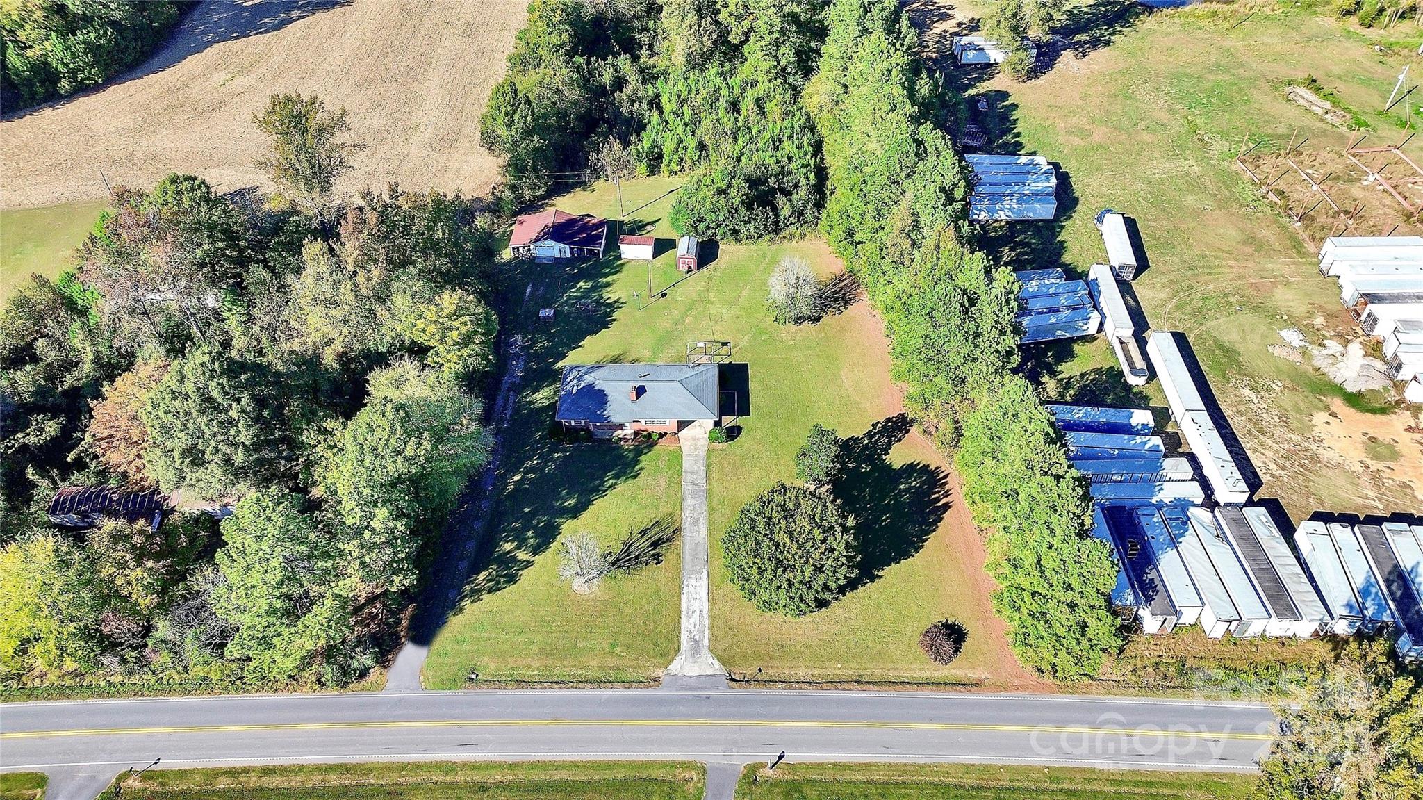 6217 Stack Road Monroe, NC 28112 - Photo 33 of 37 an aerial view of residential houses with outdoor space