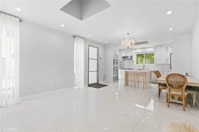 a bathroom with a sink a mirror and a shower