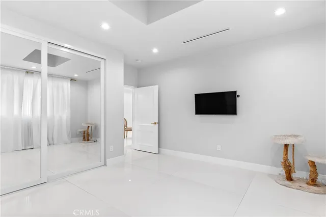 a view of a livingroom with a flat screen tv