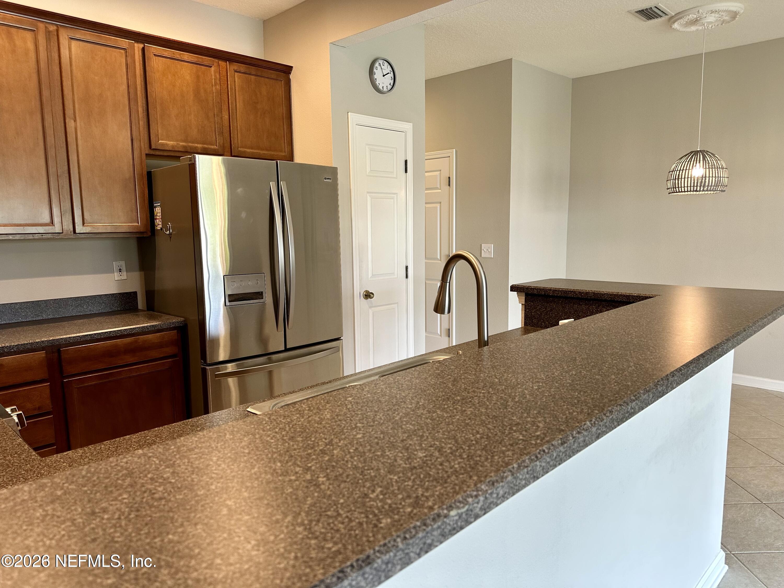 12946 Spring Rain Road Jacksonville, FL 32258 - Photo 7 of 25 KITCHEN