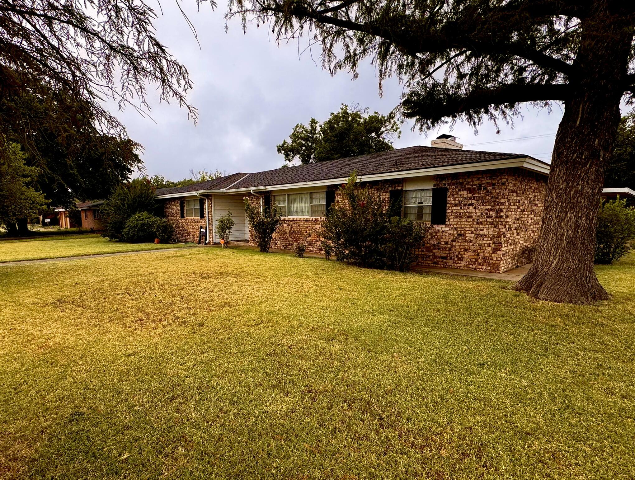 1209 Garland Plainview, TX 79072 - Photo 1 of 38 a view of a house with a yard