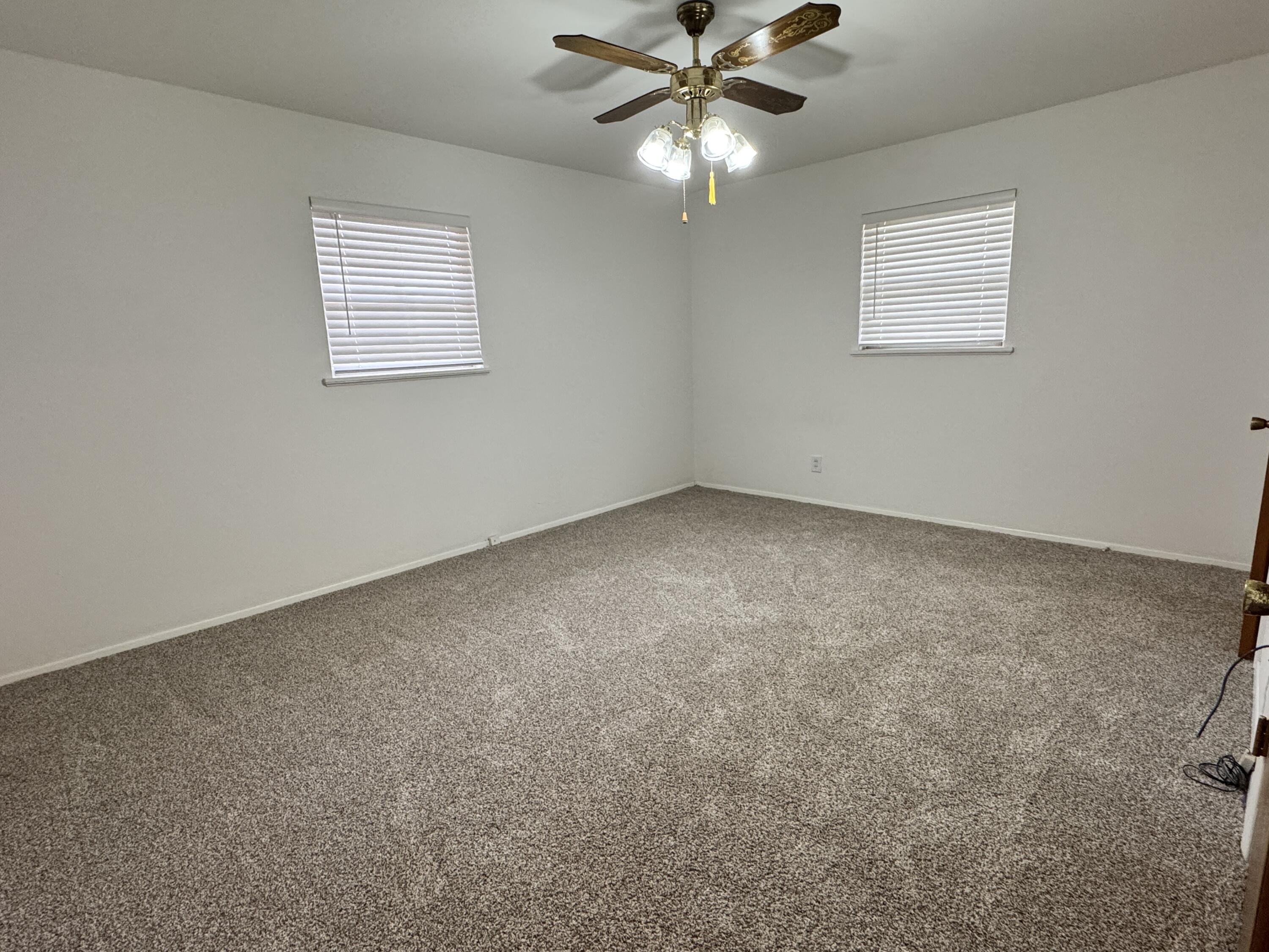 1209 Garland Plainview, TX 79072 - Photo 22 of 38 a view of an empty room with a window