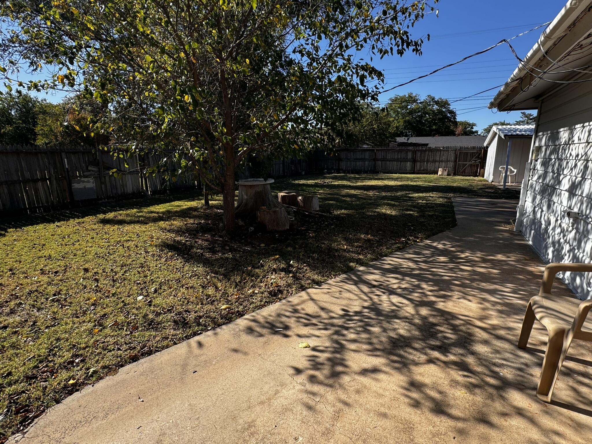 1209 Garland Plainview, TX 79072 - Photo 27 of 38 a backyard of a house with lots of green space