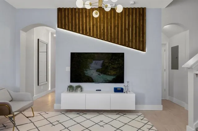 a living room with a couch and a flat screen tv