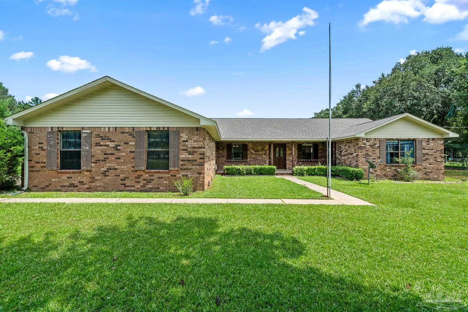 6160 Saddle Club Road Pace, FL 32571 - Photo 3 of 49 a view of outdoor space yard and porch