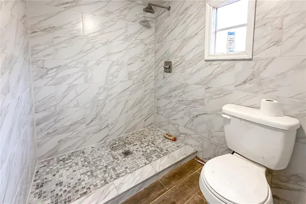 a room with table and chairs