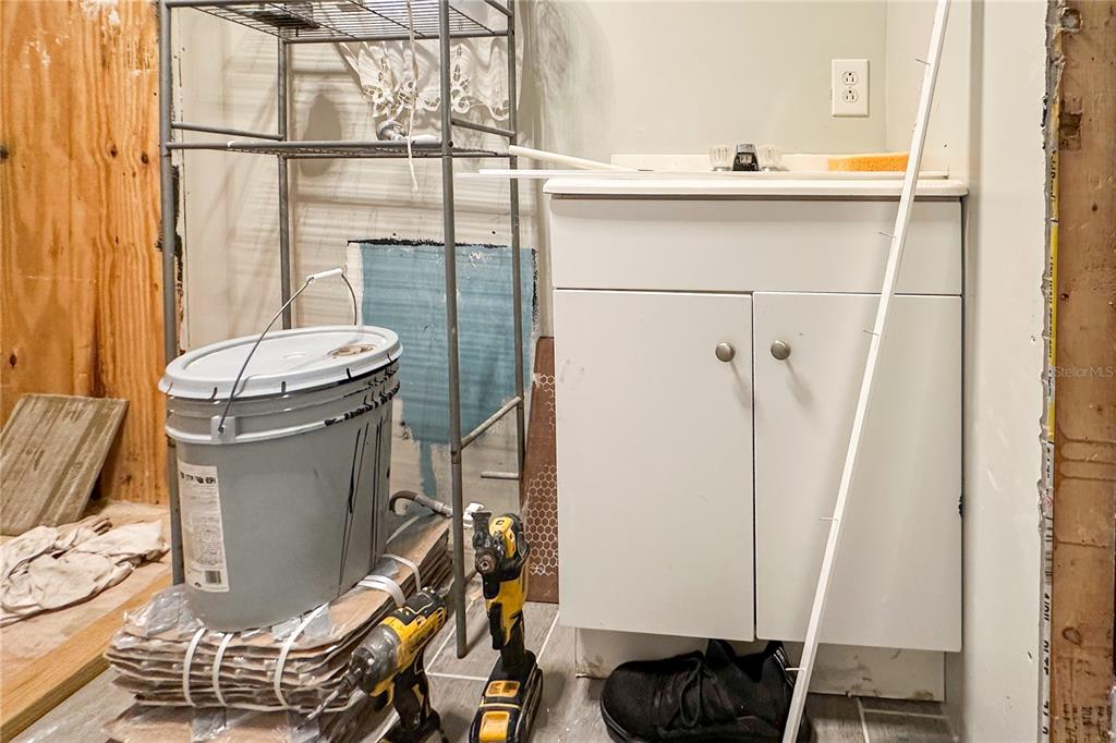 198 Spurlock Road Frostproof, FL 33843 - Photo 30 of 50 a bathroom with a sink a toilet and shower