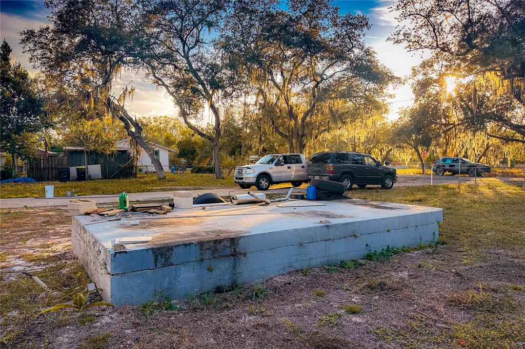 198 Spurlock Road Frostproof, FL 33843 - Photo 48 of 50 a view of a yard with large trees