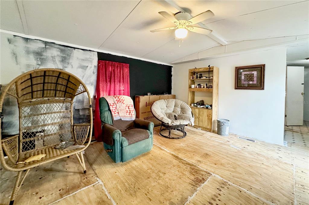 198 Spurlock Road Frostproof, FL 33843 - Photo 9 of 50 a living room with furniture