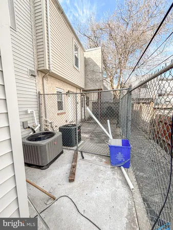a view of a back yard of the house