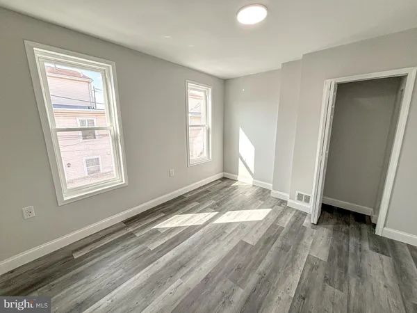 a view of livingroom with hardwood floor and window