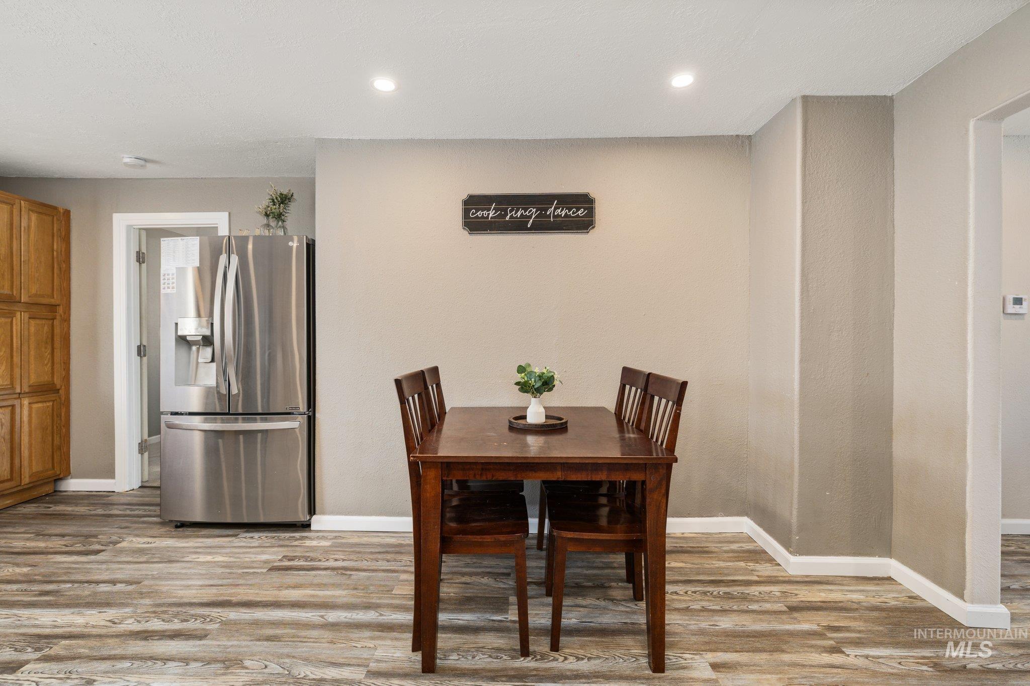 1504 2nd Street North Nampa, ID 83687 - Photo 13 of 29 Dining space featuring light wood-style flooring and recessed lighting
