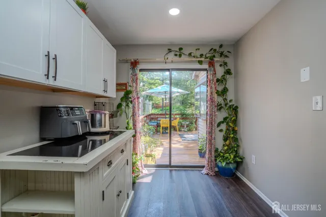 a kitchen that has a sink and a stove in it