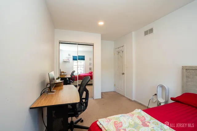 a view of a workspace with furniture